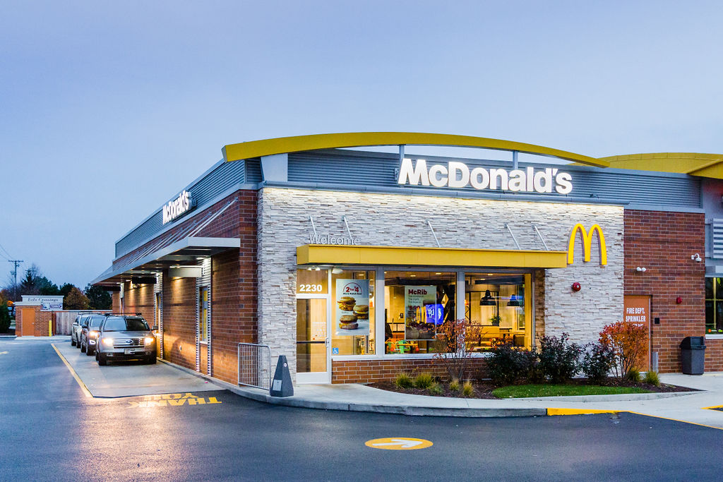 McD Standard drive thru lane dusk with cars